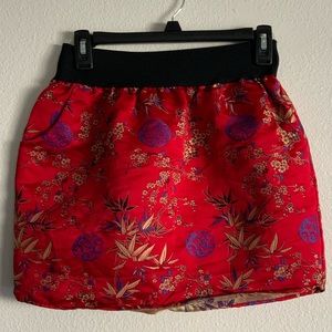 Red oriental mini skirt with pockets